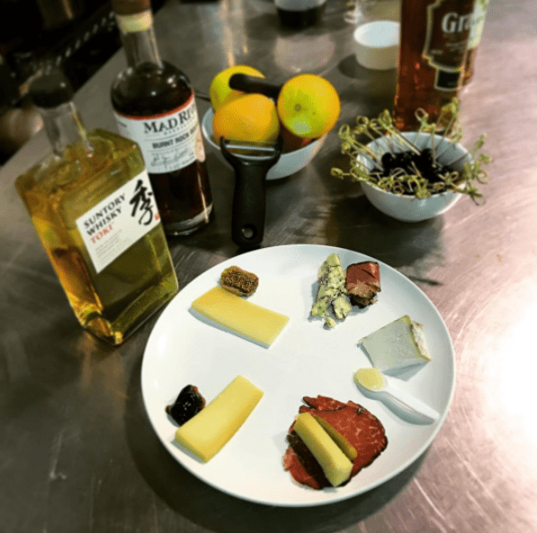 cheese, meat, and whiskey tasting