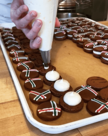 gingerbread macarons being filled
