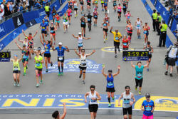 marathon runners at finish line