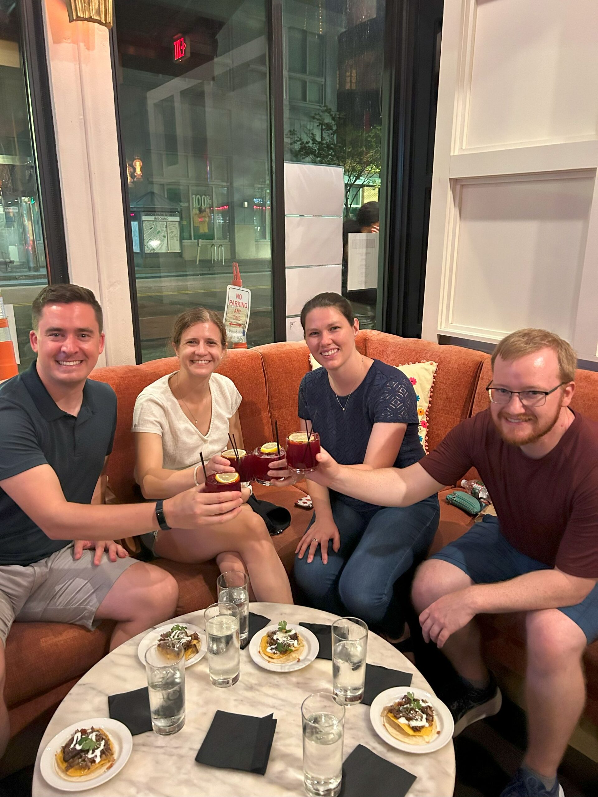 a group sitting together at a table